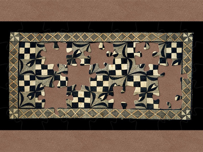 Siapo (tapa cloth), about 1917, Samoa, maker unknown. Gift of Thomas Trood, 1917. Te Papa (FE001423) Tapa cloth. The border is a network of orange Xs, while the internal patterns alternate between checkerboards and flowers